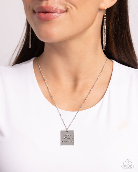 <p>Infused with dainty silver studs on a dainty silver chain, a silver rectangular plate is stamped with the phrase "mama all day every day," for a monochromatic, minimalistic tribute. Features an adjustable clasp closure.</p> <p><i> Sold as one individual necklace. Includes one pair of matching earrings.</i></p>
