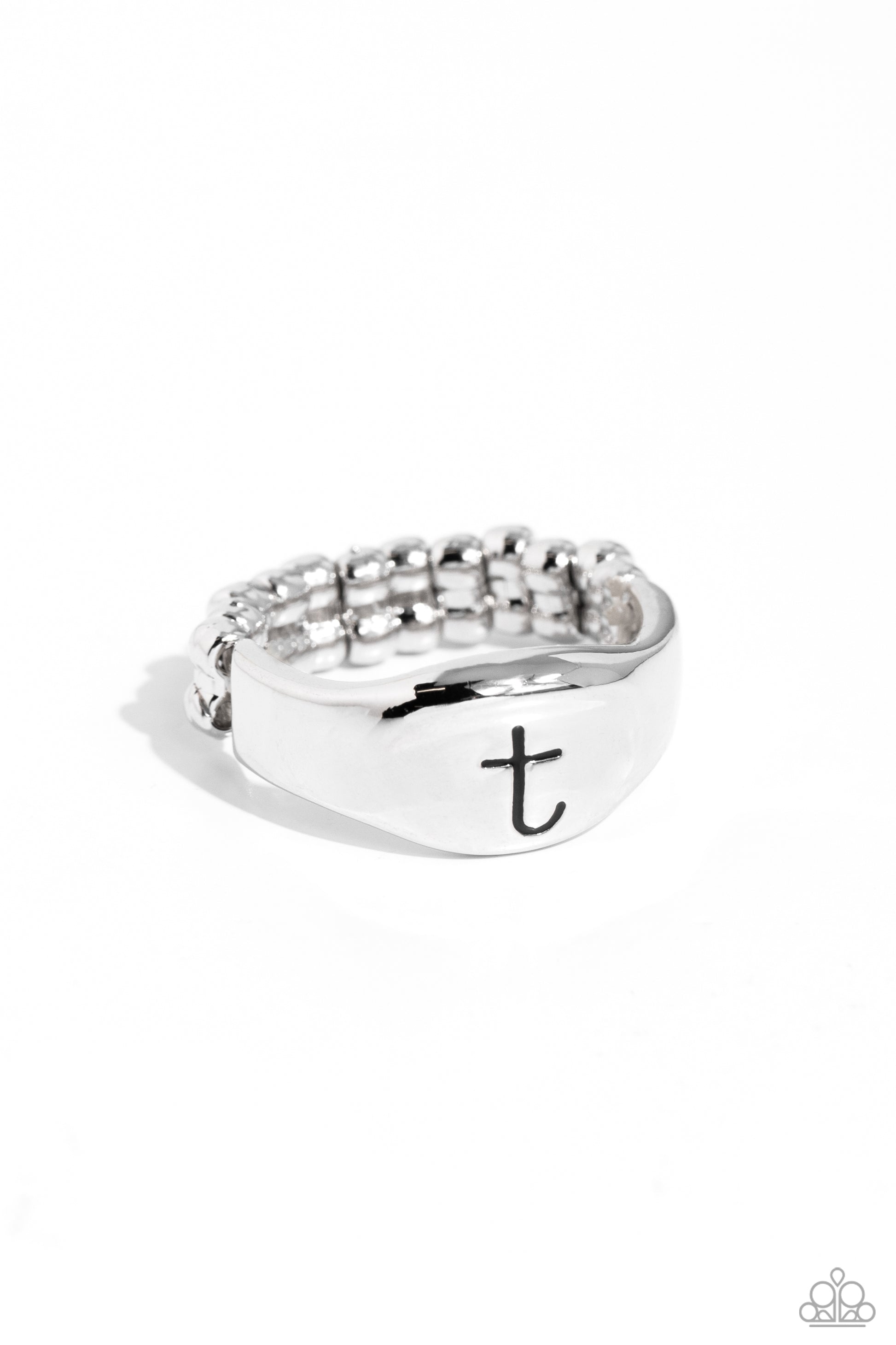 <p>Pressed into the center of a beveled silver band, the black letter "t" stands out for a simple, sentimental centerpiece. Features a stretchy band for a flexible fit.</p> <p><i> Sold as one individual ring.</i></p>