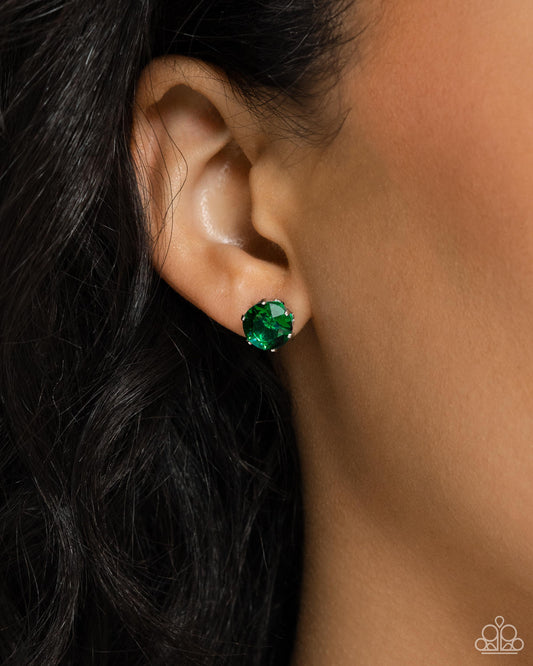 <p>A sparkling emerald rhinestone is nestled inside a classic silver frame for a beautiful birthstone-inspired display. Earring attaches to a standard post fitting.</p> <p><i> Sold as one pair of post earrings.</i></p>