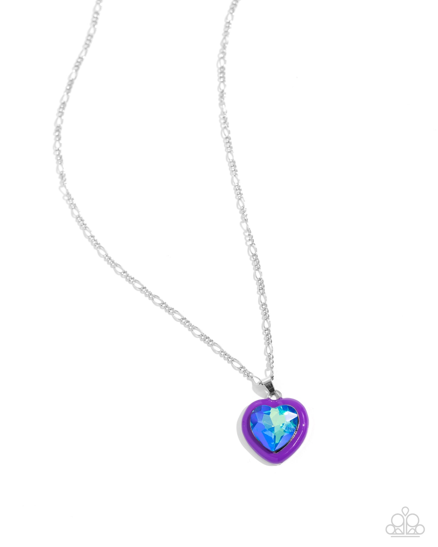 <p>Pressed in a border of purple paint, an oversized UV shimmery heart gem is flirtatiously attached to a silver figaro chain, resulting in a romantic-inspired display. Features an adjustable clasp closure.</p> <p><i> Sold as one individual necklace. Includes one pair of matching earrings. </i></p> <br><b> Get The Complete Look! </b> <br>Earring: "Heartfelt Haute - Purple" (Sold Separately)<br>