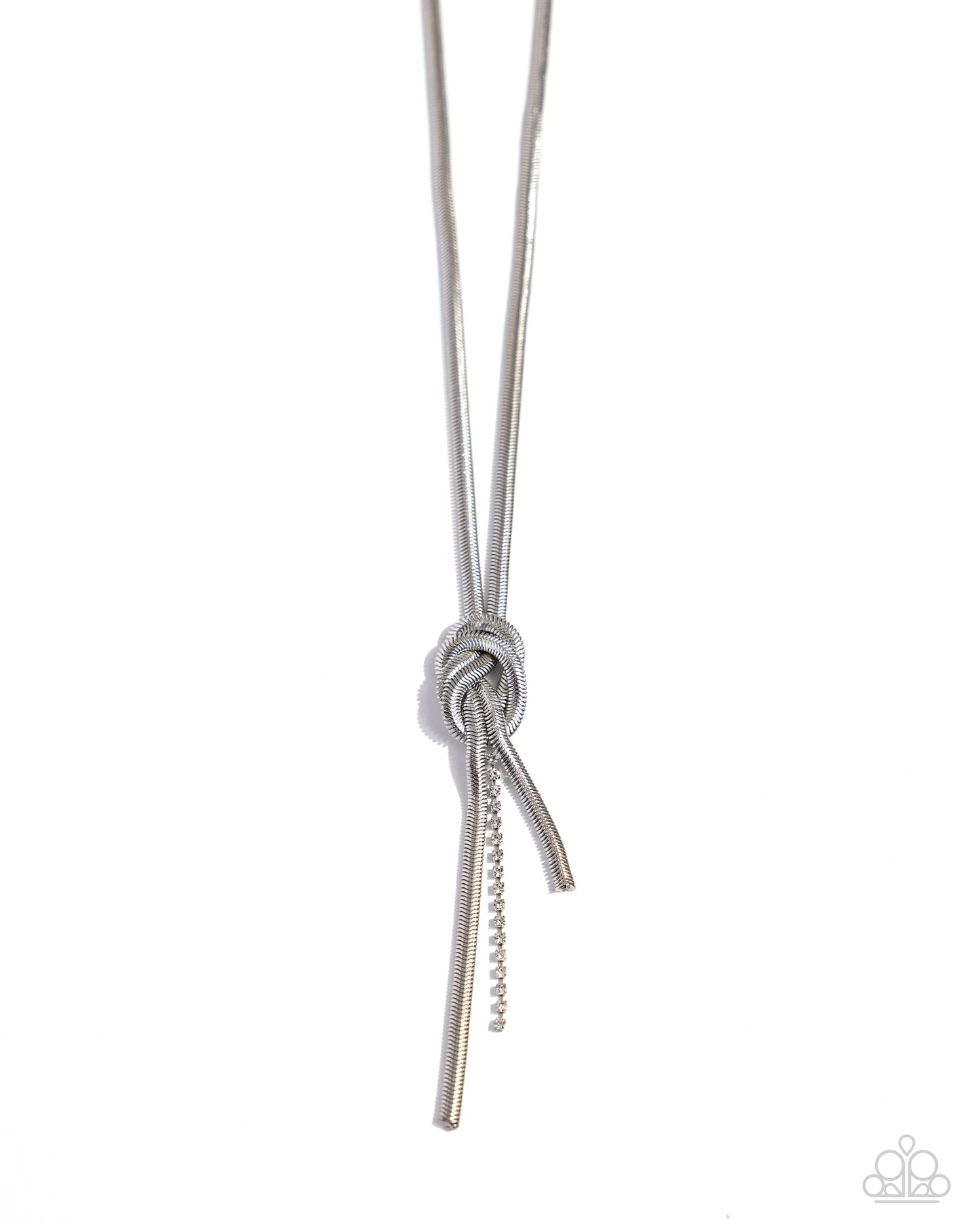 <p>An edgy collection of silver snake chains knot into an intense fringe, creating a bold industrial look. A dainty strand of white rhinestones emerges from the knot for a surprising hint of shimmery movement. Features an adjustable clasp closure.</p> <p><i> Sold as one individual necklace. Includes one pair of matching earrings.</i></p>
