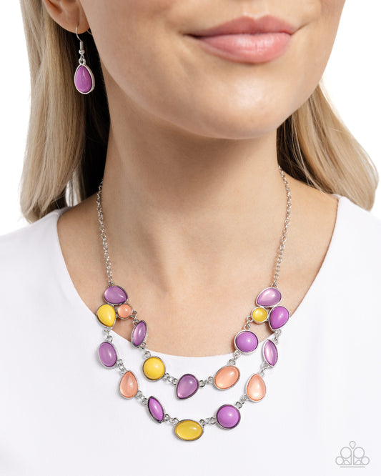 <p>A mismatched collection of glossy and opaque lavender, Desert Flower, and Lemon Drop teardrop, marquise, and round beads in silver frames delicately connect into a bubbly clustered pendant below the collar, creating a colorful statement piece. Features an adjustable clasp closure.</p> <p><i> Sold as one individual necklace. Includes one pair of matching earrings.</i></p>
