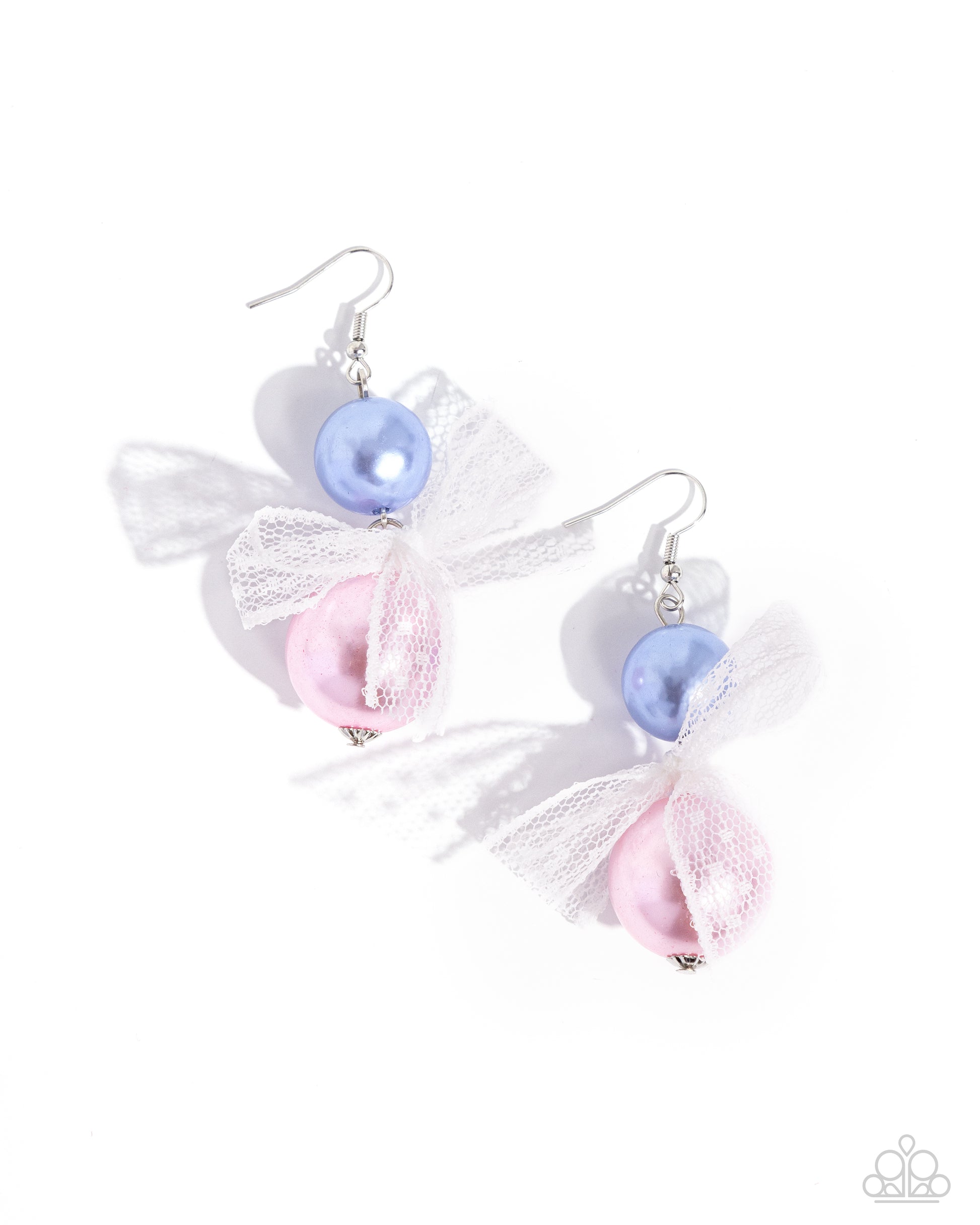 <p>Two glossy pearls one in blue and one in pink stack atop one another while an airy, chiffon white ribbon is tied in the center of the pearls for a refined finish. Earring attaches to a standard fishhook fitting.</p> <p><i> Sold as one pair of earrings. </i></p> <br><b> Get The Complete Look! </b> <br>Bracelet: "Girly Glam - Multi" (Sold Separately)