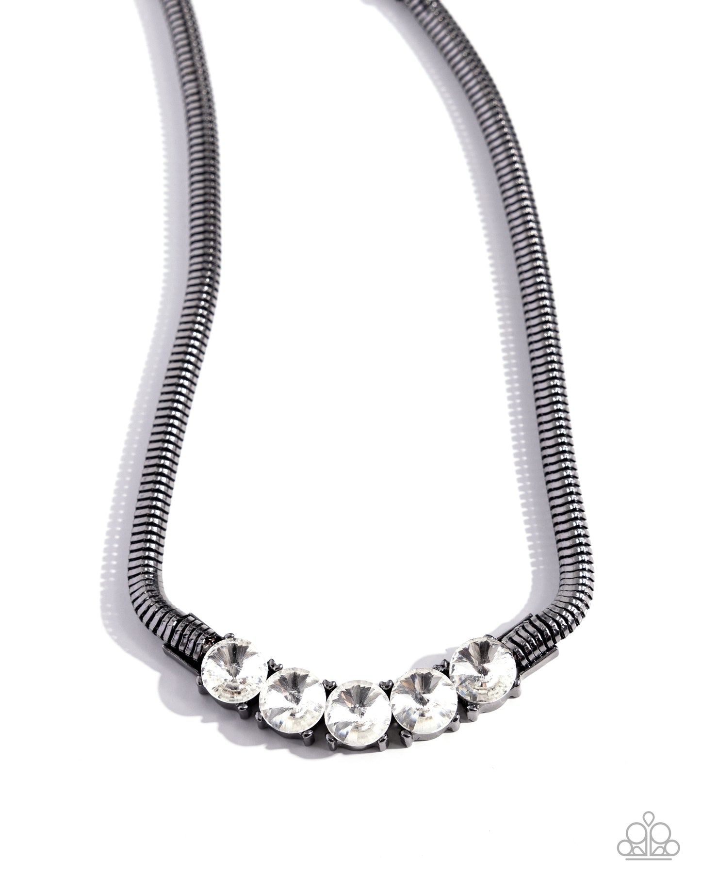 <p>Pronged in place along the center of a thick gunmetal chain, faceted white gems twinkle below the neckline for a glittery, grungy look. Features an adjustable clasp closure.</p> <p><i> Sold as one individual necklace. Includes one pair of matching earrings.</i></p>