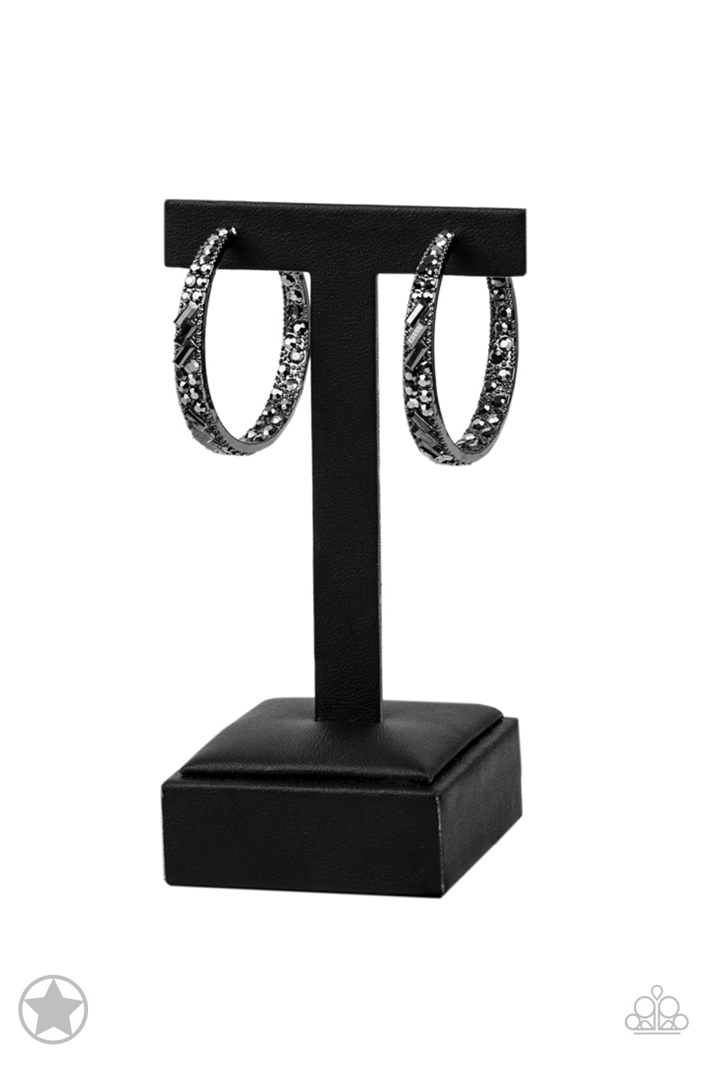 The front facing surface of a chunky gunmetal hoop is dipped in brilliantly sparkling hematite rhinestones while light-catching texture wraps around the back. The interior of the hoop features the opposite pattern, creating the illusion of a full hoop of blinding shimmer. Earring attaches to a standard post fitting. Hoop measures 1 3/4" in diameter.  Sold as one pair of hoop earrings.