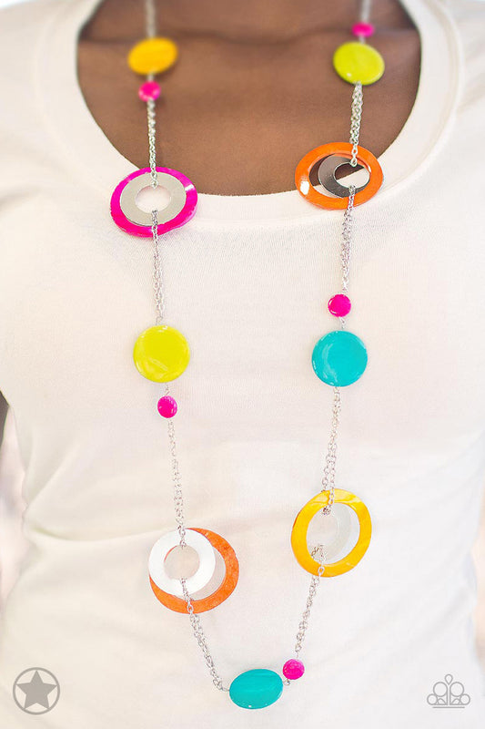 Chunky brightly-colored rings and discs with swirly marble finishes join thick metal hoops to climb a simple silver chain and create a retro-inspired feel. Features an adjustable clasp closure.   Sold as one individual necklace. Includes one pair of matching earrings.