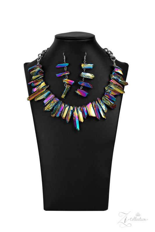 Featuring an oil spill iridescence, raw cut pieces of hematite are threaded along an invisible wire below the collar for a colorfully courageous look. Features an adjustable clasp closure.  Sold as one individual necklace. Includes one pair of matching earrings.