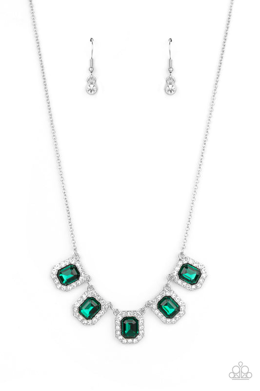 Bordered in glassy white rhinestones, verdant green emerald style rhinestone encrusted frames gorgeously link below the collar for a timeless fashion. Features an adjustable clasp closure.  Sold as one individual necklace. Includes one pair of matching earrings.