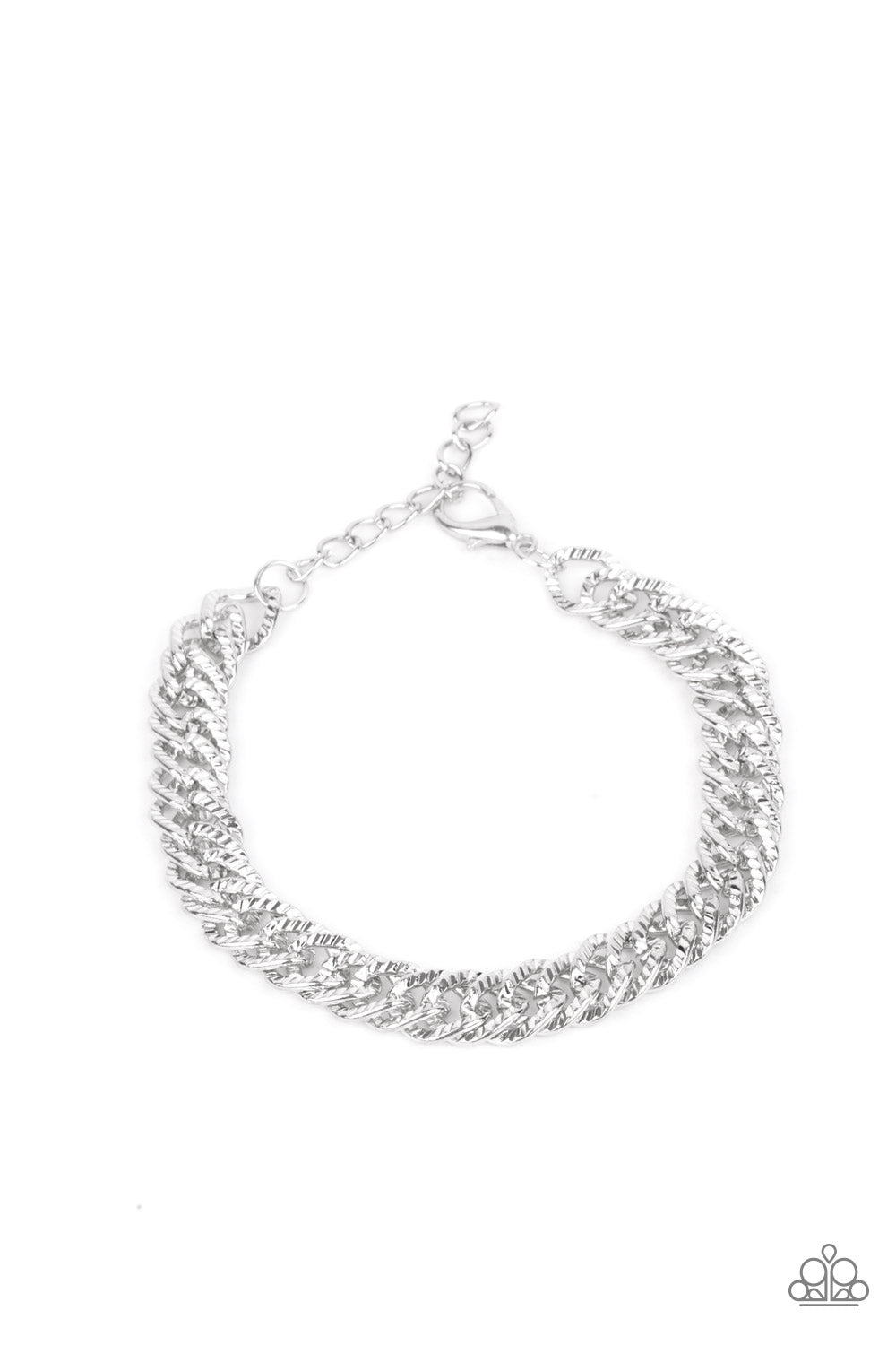 Etched in linear textures, an oversized silver chain drapes around the wrist for a dramatic industrial effect. Features an adjustable clasp closure.  Sold as one individual bracelet.   Get The Complete Look! Necklace: "Urban Uppercut - Silver" (Sold Separately)