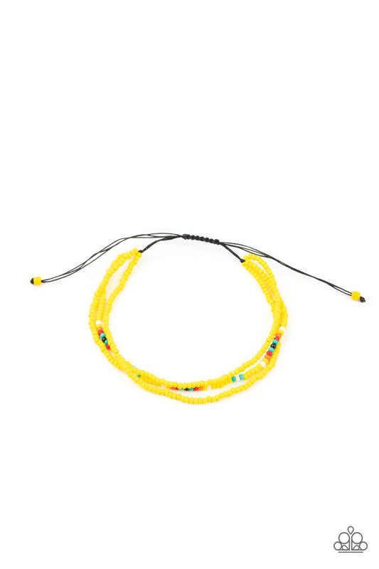 Two strands of dainty Illuminating seed beads, highlighted with a strand of brightly colored beads, form a simple accent around the wrist. Features an adjustable sliding knot closure.  Sold as one individual bracelet.