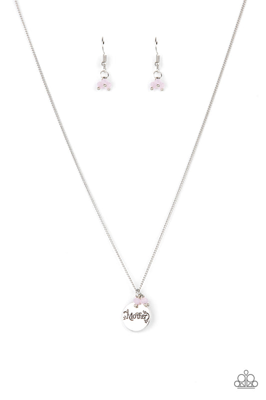 A dainty cluster of opaque pink beads delicately joins a shiny silver disc stamped in the word, "Mother," along a classic silver chain, creating a whimsical pendant below the collar. Features an adjustable clasp closure.  Sold as one individual necklace. Includes one pair of matching earrings.\