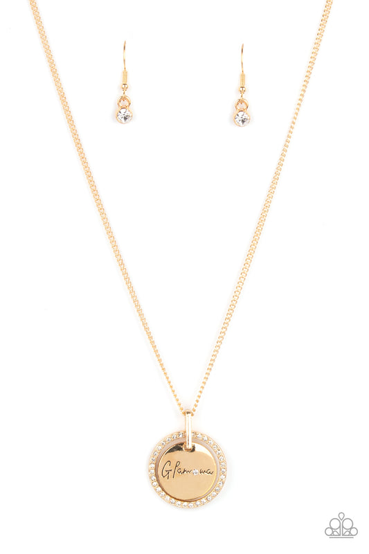 Infused with a gold ring of glassy white rhinestones, a glistening gold disc is dotted with a dainty white rhinestone and stamped in the word, "Glamma," as it swings below the collar for a glamorously sentimental look. Features an adjustable clasp closure.  Sold as one individual necklace. Includes one pair of matching earrings.