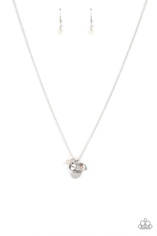 A whimsical charm collection including, a white pearl, iridescent rhinestone heart, a dainty silver disc stamped in the word, "Mom," and a silver pendant stamped in the motivational phrase, "Do all things with love," delicately glide along a dainty silver chain below the collar for an endearing fashion. Features an adjustable clasp closure.  Sold as one individual necklace. Includes one pair of matching earrings.