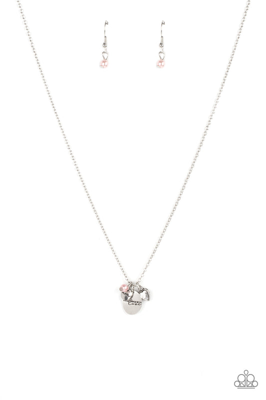 A whimsical charm collection including, a pink pearl, glittery rhinestone heart, a dainty silver disc stamped in the word, "Mom," and a silver pendant stamped in the motivational phrase, "Do all things with love," delicately glide along a dainty silver chain below the collar for an endearing fashion. Features an adjustable clasp closure.  Sold as one individual necklace. Includes one pair of matching earrings.