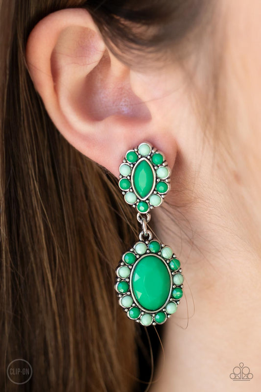Bordered in dainty Mint and Green Ash beads, a pair of marquise and oval Mint beads delicately link into a colorful lure for a fresh pop of color. Earring attaches to a standard clip-on fitting.  Sold as one pair of clip-on earrings.