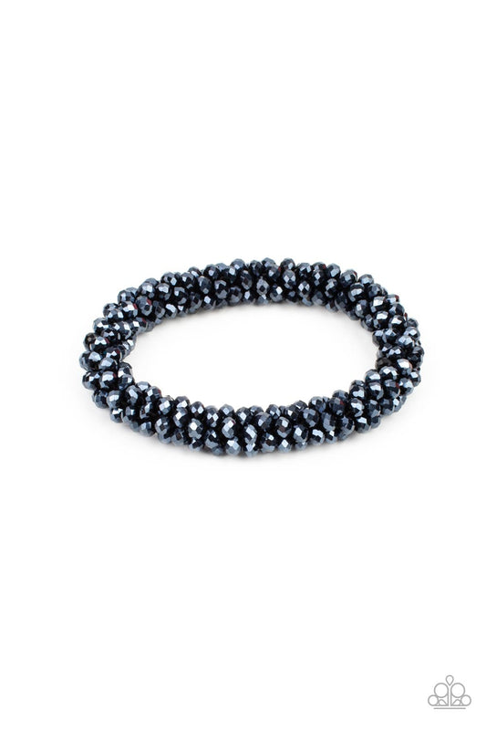 Sparkling with dramatic brilliance, a collection of dainty faceted blue beads are threaded along a woven stretchy band creating a stunning statement around the wrist.  Sold as one individual bracelet.