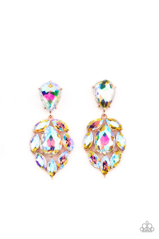 A stellar collection of marquise cut iridescent rhinestones nestle around an oversized teardrop iridescent rhinestone, creating a dramatically stellar display at the bottom of a matching iridescent teardrop rhinestone. Earring attaches to a standard post fitting.  Sold as one pair of post earrings.