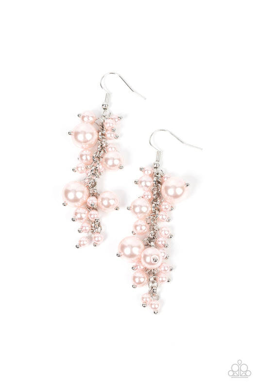 A bubbly collection of timeless pink pearls trickles along a single silver chain, resulting in an effervescently elegant tassel. Earring attaches to a standard fishhook fitting.  Sold as one pair of earrings.