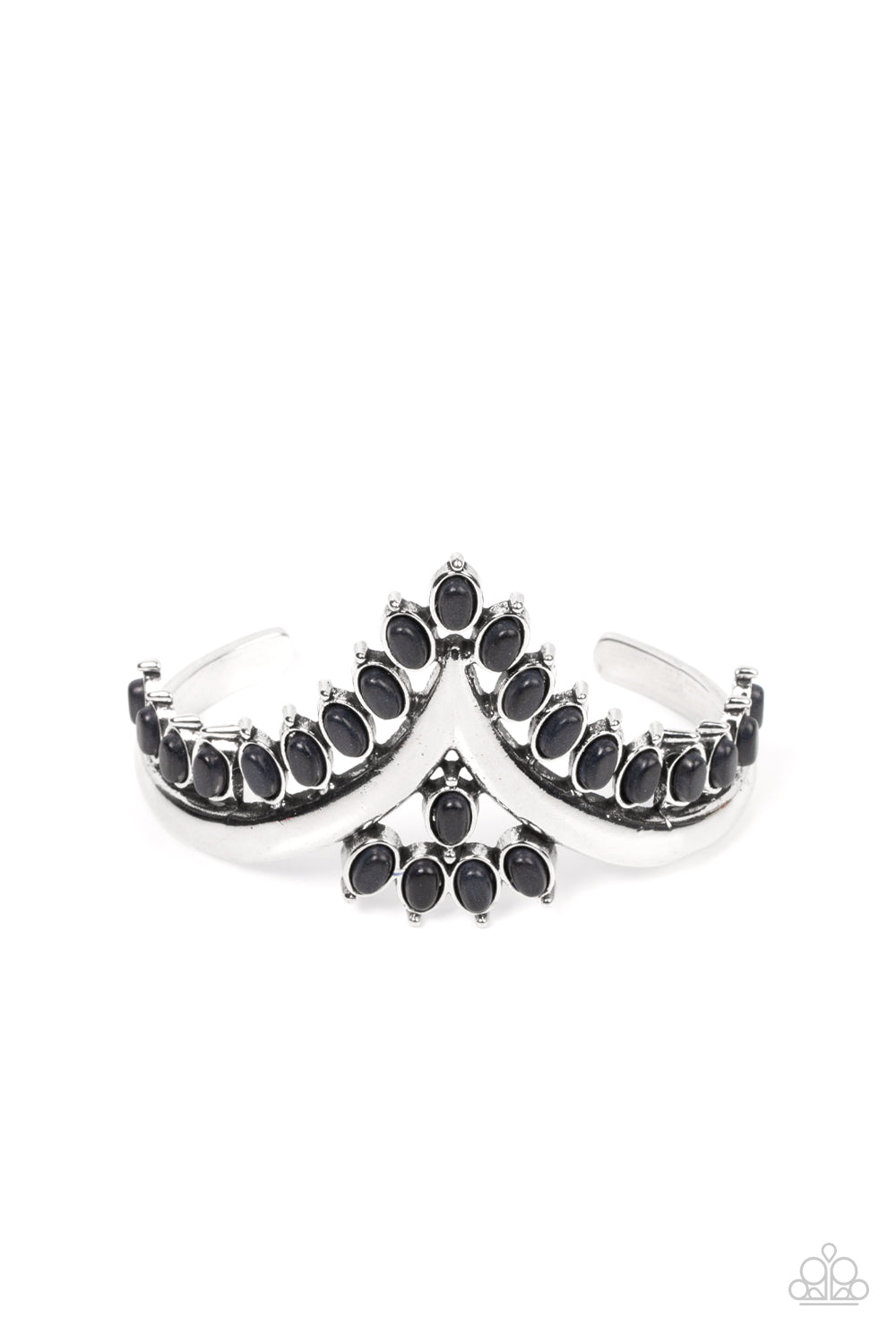Black oval stones, encased in studded silver frames, line the edge of a daring V-shaped silver cuff. A gathering of black stones adorns the center of the bracelet, adding a finishing touch to the rustically regal cuff.  Sold as one individual bracelet.