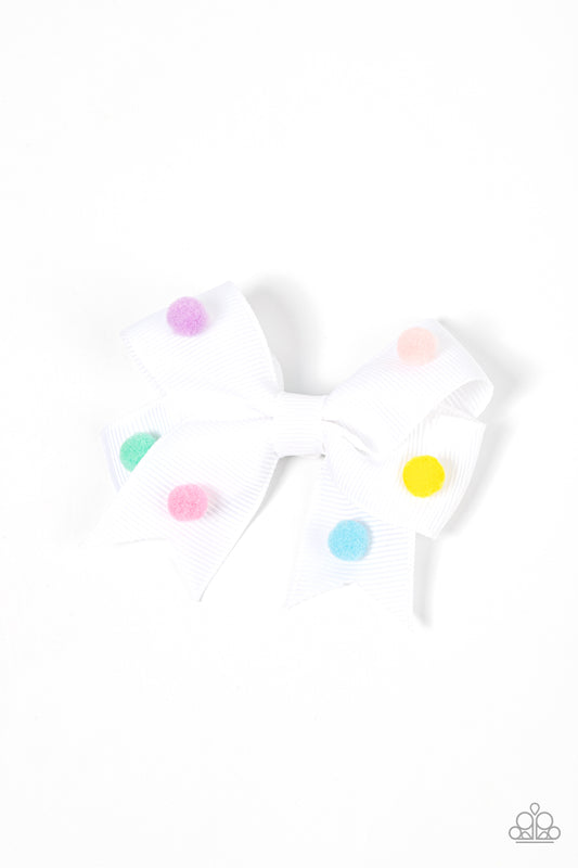 Dainty multicolored pom poms dot the front of a ribbed white ribbon that neatly knots into a charming bow, creating a whimsical centerpiece. Features a standard hair clip on the back.  Sold as one individual hair clip.