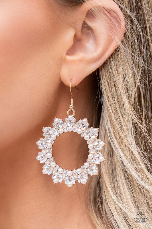 A bubbly collection of dainty white pearls and marquise-cut rhinestones explodes across the front of a gold wreath, resulting in jaw-dropping dazzle. Earring attaches to a standard fishhook fitting.  Sold as one pair of earrings.