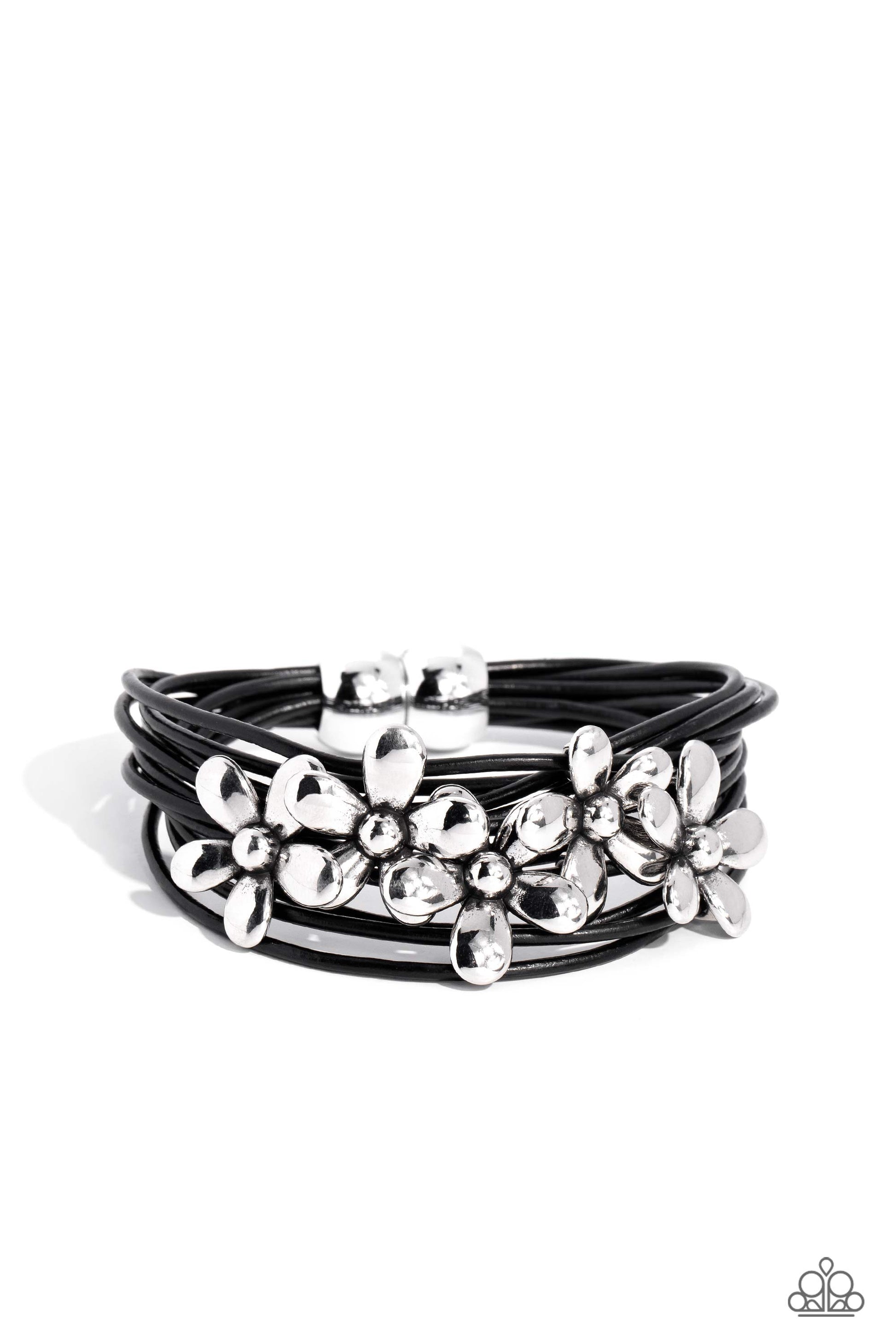 Shiny silver flowers glide along leathery black cords, clustering into a shimmery floral statement piece at the center of the wrist. Features a magnetic closure.  Sold as one individual bracelet.