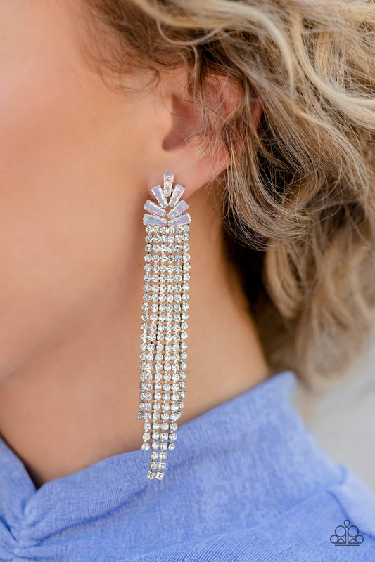 Sparkly strands of dainty white rhinestones stream out from the bottom of a silver frame made up of a staggered collection of iridescent and trapezoidal cut rhinestones, resulting in a timeless tassel. Earring attaches to a standard post fitting.  Sold as one pair of post earrings.