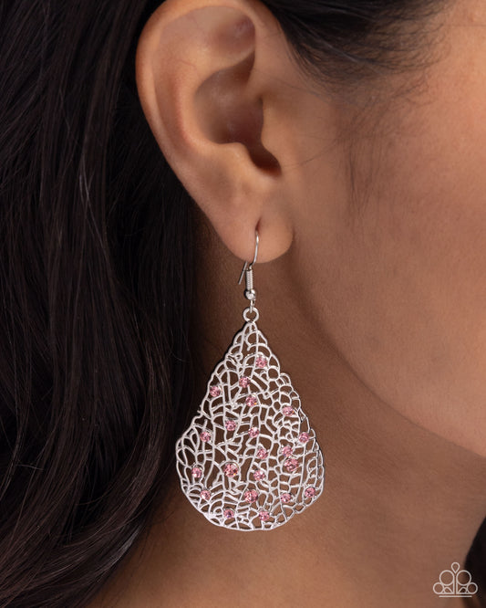 <p>Glassy Gossamer Pink rhinestones are sprinkled across a fractured backdrop of silver, resulting in an abstract twinkle. Earring attaches to a standard fishhook fitting.</p> <p><i> Sold as one pair of earrings.</i></p>