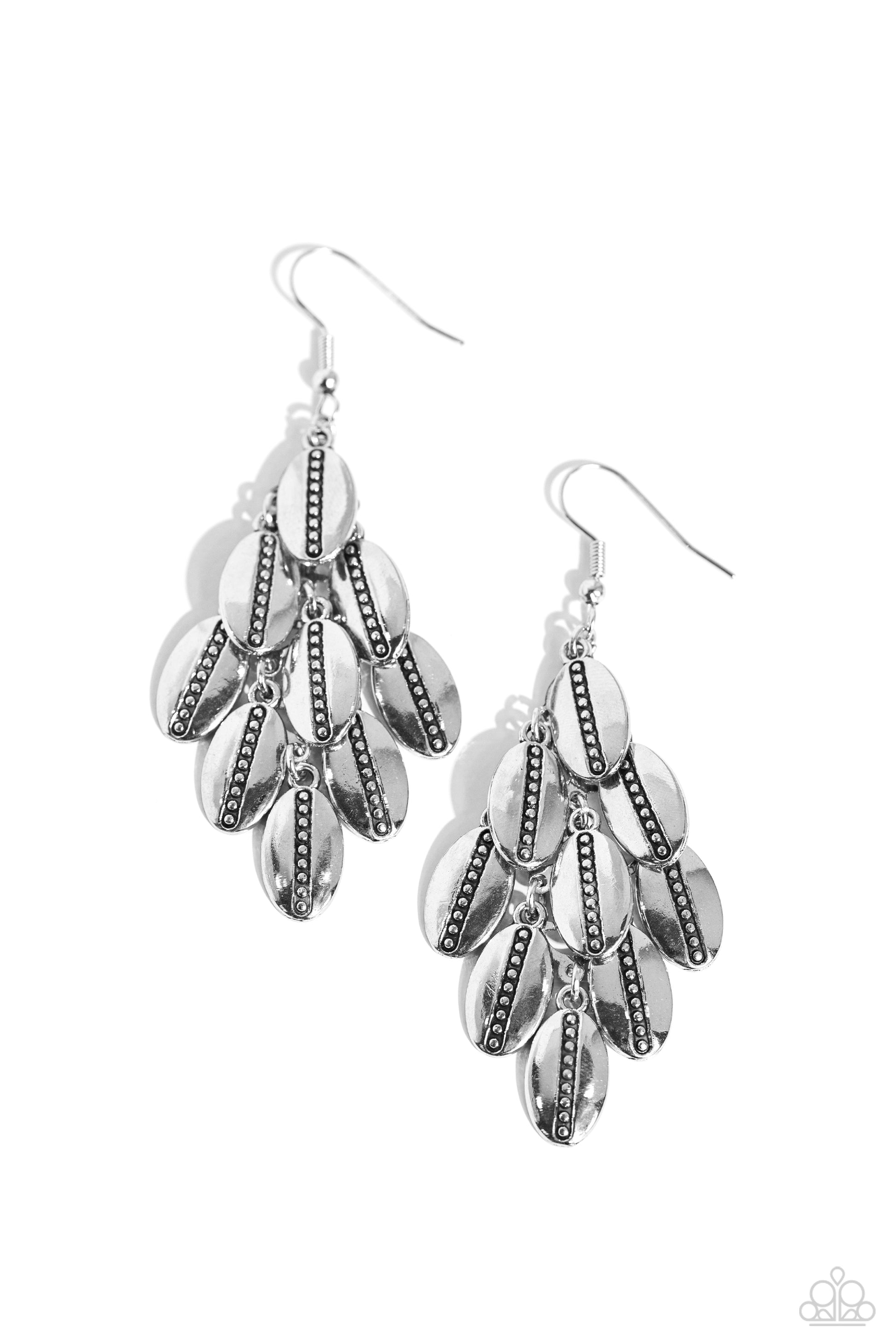 Dainty silver studs are pressed down the centers of oval silver frames that cascade from a silver netted backdrop, resulting in a rustic chandelier. Earring attaches to a standard fishhook fitting.  Sold as one pair of earrings.