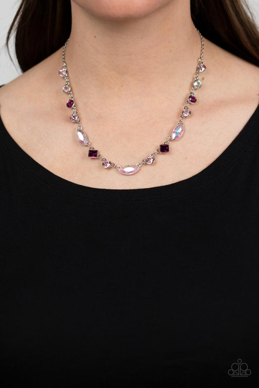 Varying in geometric shapes and shades of pink, glittery rose and fuchsia gems are sprinkled between iridescent rhinestone accents for a dreamy refined, and irresistible finish. Features an adjustable clasp closure. Due to its prismatic palette, color may vary.  Sold as one individual necklace. Includes one pair of matching earrings.