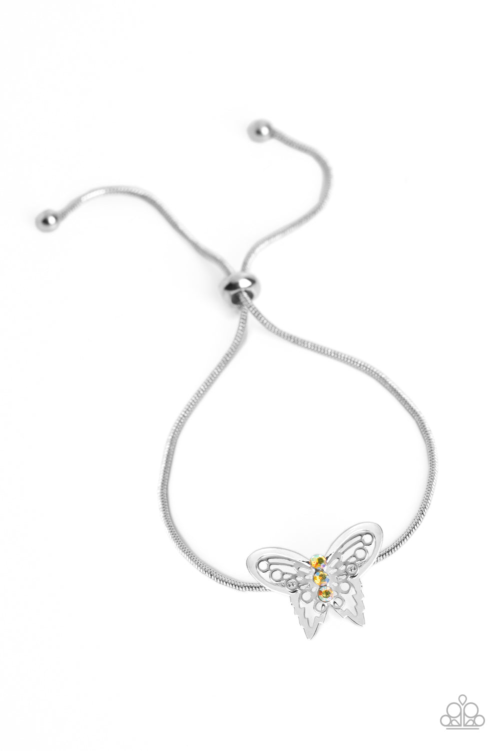 A deceptively simple silver butterfly charm glides along a silver snake chain for a whimsical flair along the wrist. Dainty, yellow rhinestones, brushed in a UV shimmer, encrust along the butterfly's body, creating an understated shimmer, while intricate, airy wings fold out from the sparkle, adding a 3D effect to the design. Features an adjustable sliding knot closure. Due to its prismatic palette, color may vary.  Sold as one individual bracelet.