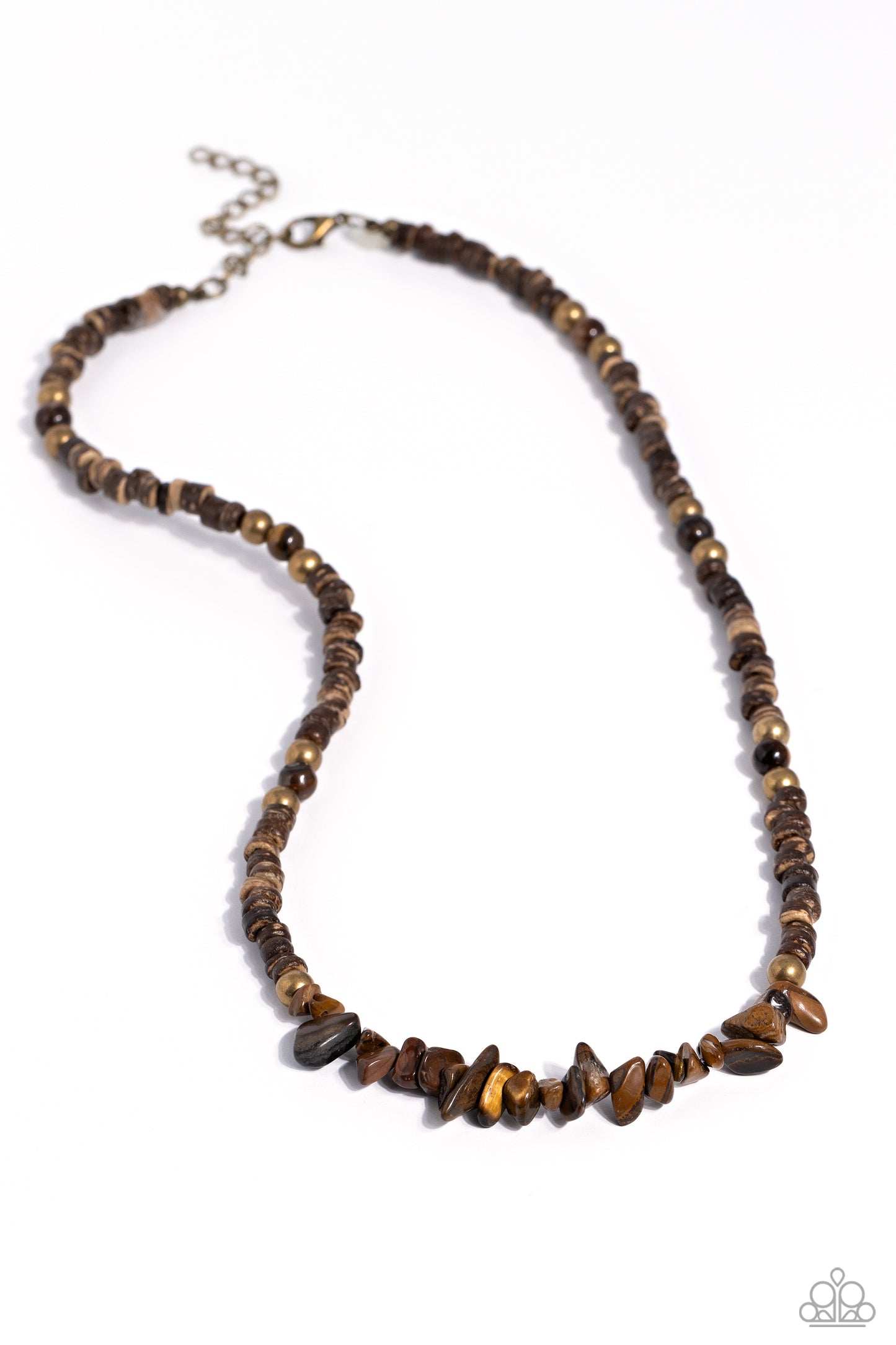 Threaded along an invisible wire, brown wooden beads, brass beads, and tiger's eye pebbles and beads haphazardly coalesce down the neckline for an earthy finish. Features an adjustable clasp closure. As the stone elements in this piece are natural, some color variation is normal.  Sold as one individual necklace.