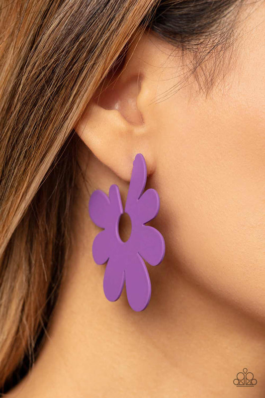 Asymmetrical, oversized purple petals bloom into an abstract flower hoop for a fashionable, attention-grabbing pop of color around the ear. Earring attaches to a standard post fitting. Hoop measures approximately 2" in diameter.  Sold as one pair of hoop earrings.