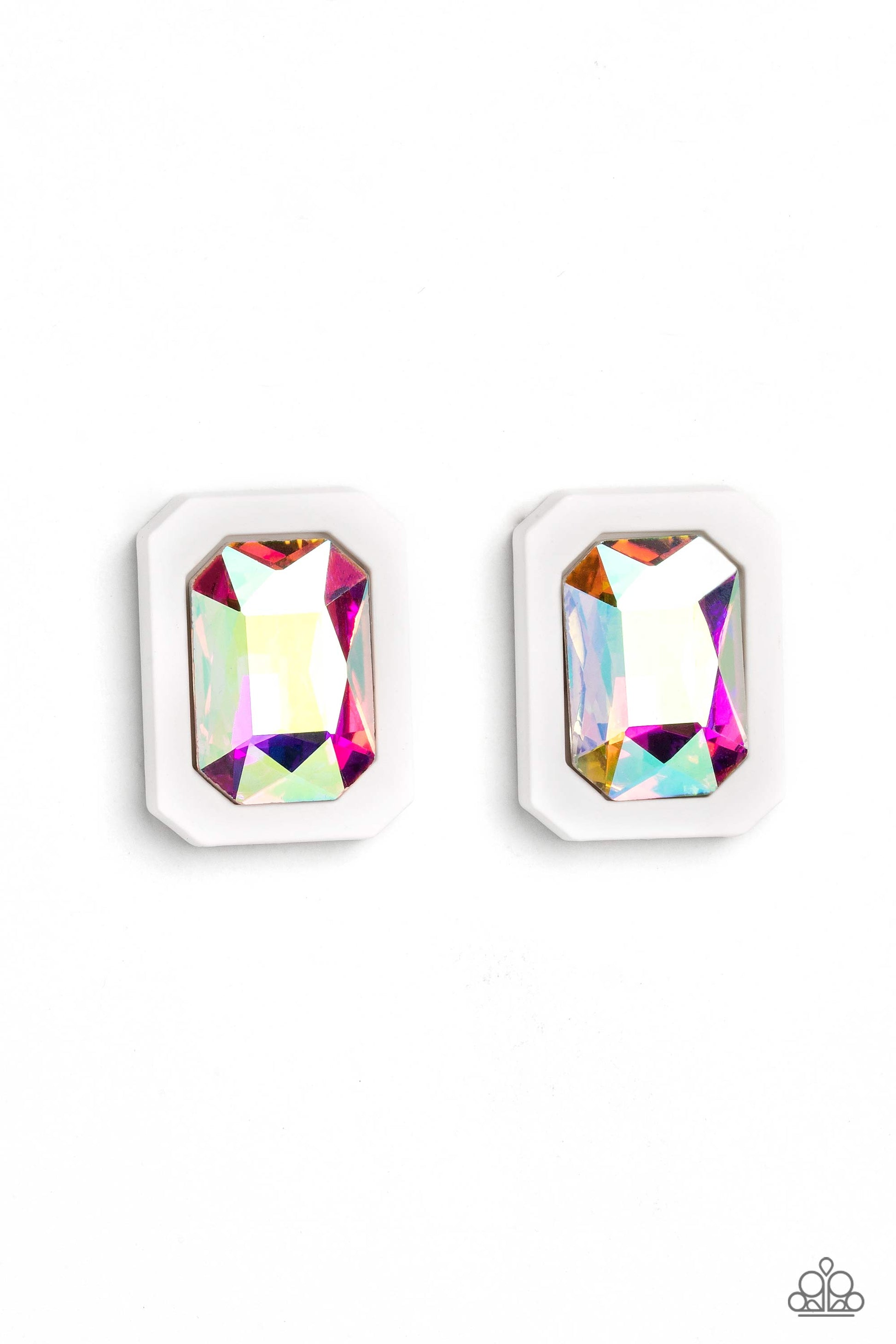 Standing out against a white rubber backdrop, an oversized, faceted emerald-cut iridescent gem shimmers and shines for an edgy sparkle against the ear. Earring attaches to a standard post fitting. Due to its prismatic palette, color may vary.  Sold as one pair of post earrings.