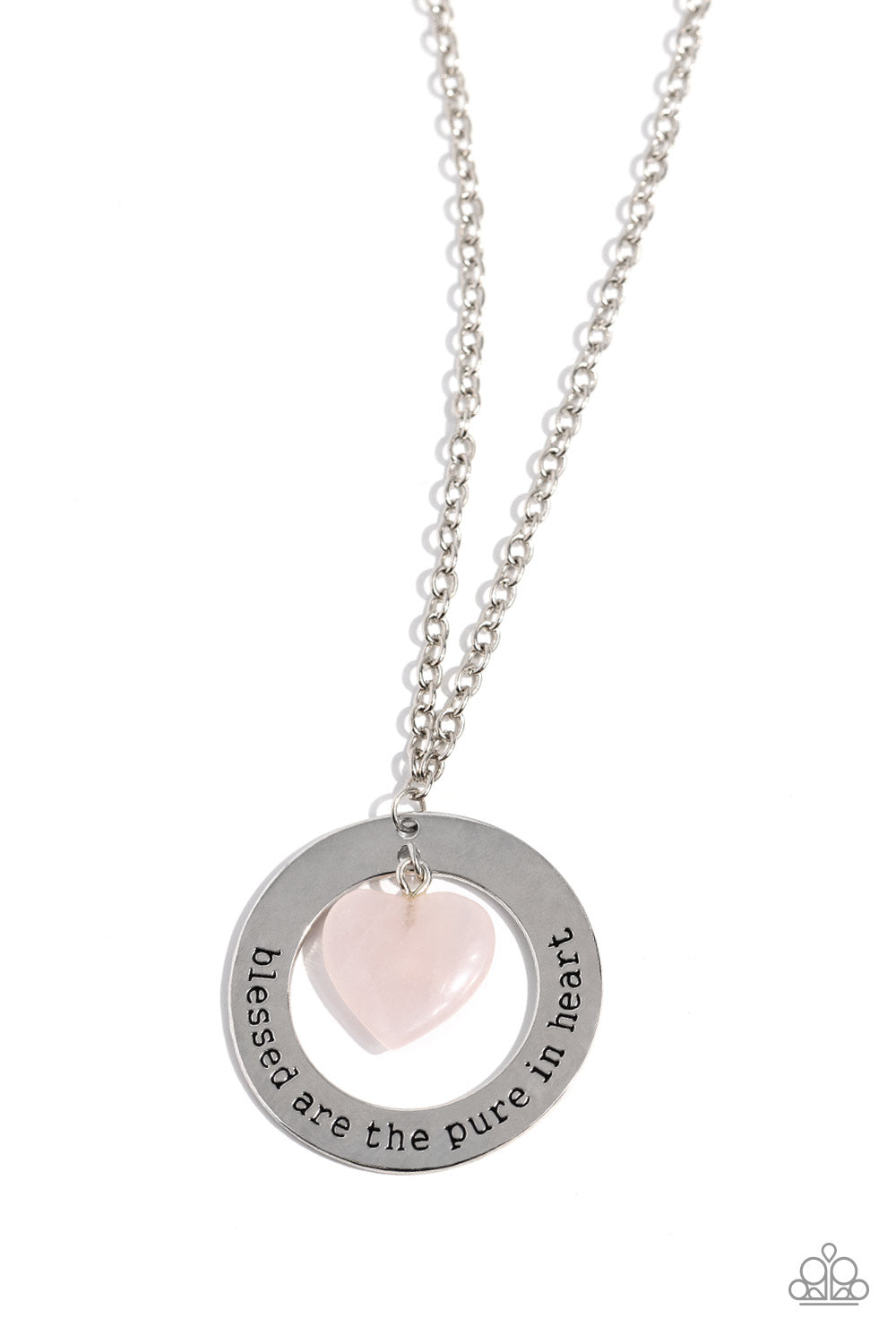 A pink stone heart swings from the bottom of an oversized silver hoop fitting, creating a simplistically earthy pendant at the bottom of a classic silver chain. The phrase "blessed are the pure in heart" is stamped along the curve of the silver hoop frame, finishing the design off with an inspirational finish. Features an adjustable clasp closure. As the stone elements in this piece are natural, some color variation is normal.     Sold as one individual necklace. Includes one pair of matching earrings.