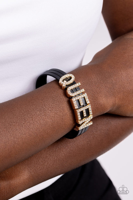 Featuring glistening white rhinestones, gold letter frames forming the word "QUEEN" are threaded along layers of black leather strands around the wrist for a dazzling statement. Features a magnetic closure.  Sold as one individual bracelet.