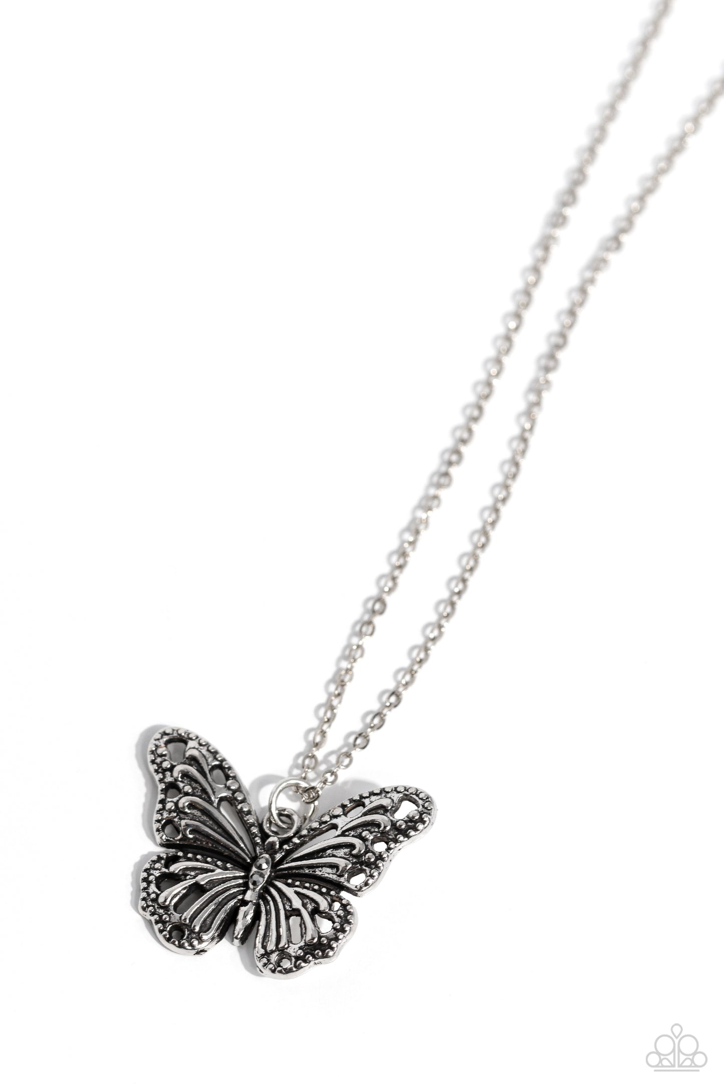 Filled with filigree, studded details, and dainty hematite accents, a rustic silver butterfly flutters from the bottom of a dainty silver chain for a whimsical fashion. Features an adjustable clasp closure.  Sold as one individual necklace. Includes one pair of matching earrings.
