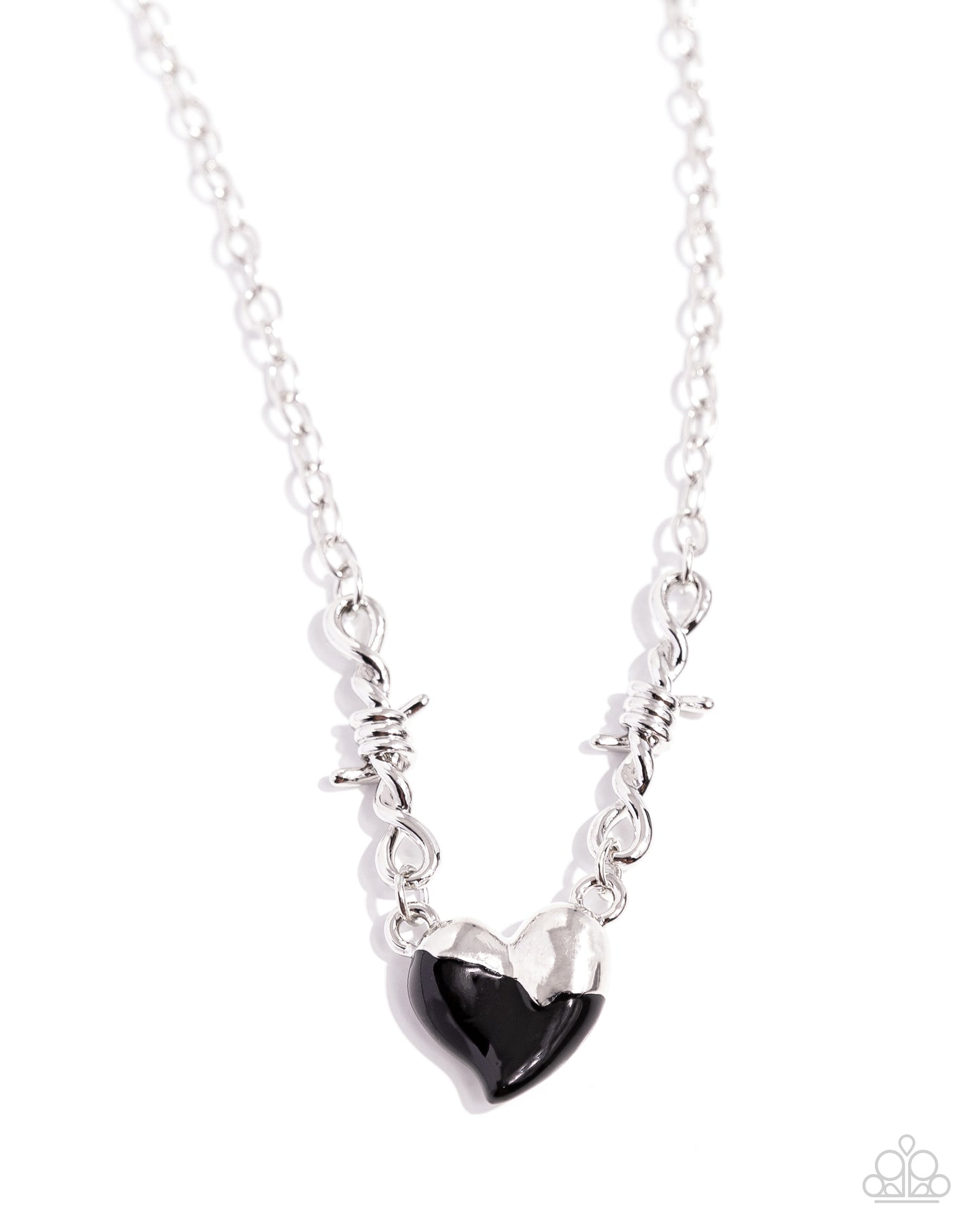 <p>Twists of silver and a half-silver, half-, black-painted heart connect to a classic silver chain around the collar for a trendy statement. Features an adjustable clasp closure.</p> <p><i> Sold as one individual necklace. Includes one pair of matching earrings.</i></p>